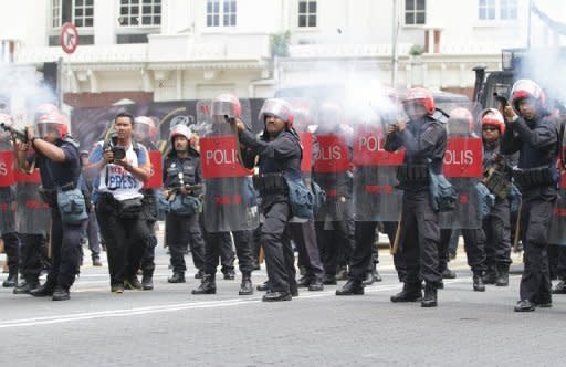 Malaysian police fire tear gas at protestors during a mass rally calling for electoral reform in Kuala Lumpur in July 2011. UN chief Ban Ki-moon on Thursday urged Malaysia to observe international human rights standards when formulating new laws to replace a tough security act that is marked for abolition