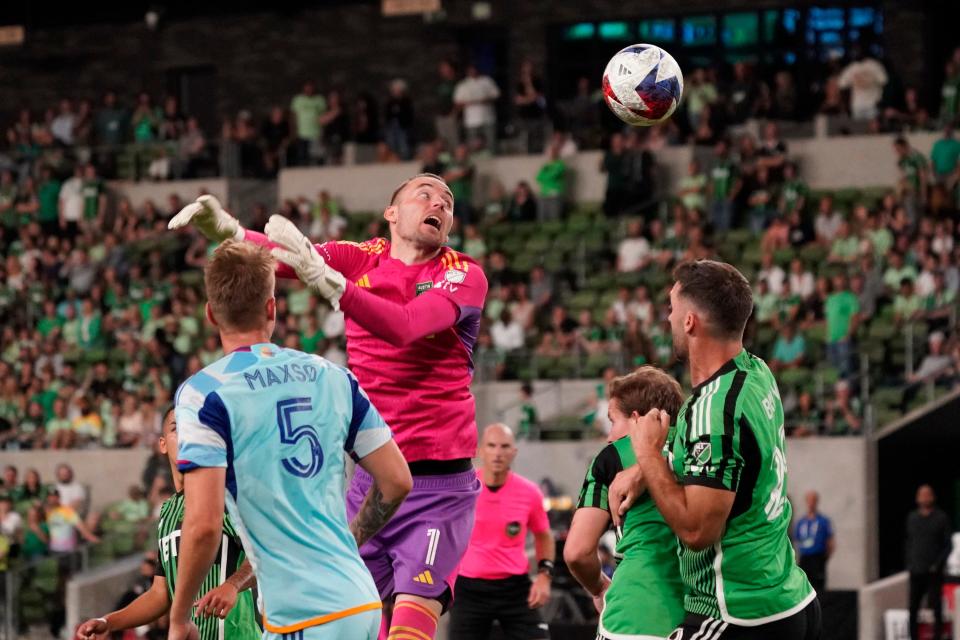 Austin FC goalkeeper Brad Stuver reacts to a shot during Saturday's 1-1 draw with Colorado. The bad news: MLS picked the awkward pink-and-purple color scheme for Stuver to wear again. The good news: El Tree is 2-0-1 when he wears it.