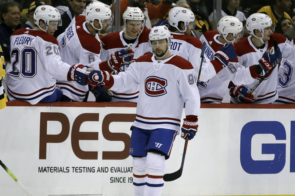 Montreal Canadiens' Tomas Tatar (90) returns to the bench after scoring during the second period of an NHL hockey game against the Pittsburgh Penguins in Pittsburgh, Tuesday, Dec. 10, 2019. (AP Photo/Gene J. Puskar)