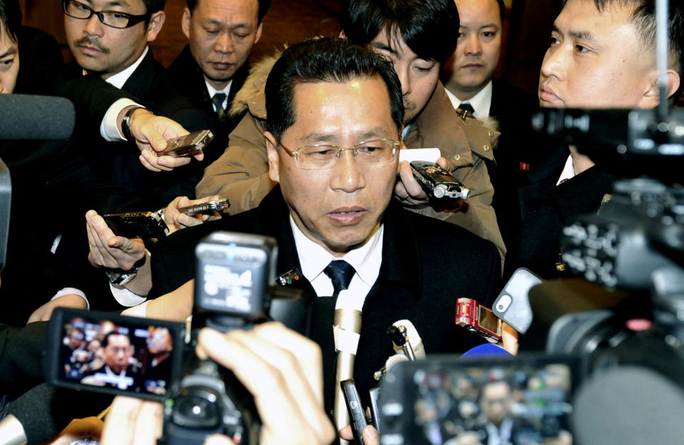 Ri Ho Rim, secretary general of North Korea's Red Cross Society, speaks to the media after a meeting with Osamu Tasaka, director general of the International Department at the Japanese Red Cross, in Shenyang, China, Monday, March 3, 2014. The North Korean and Japanese Red Cross officials met in China to discuss the repatriation of remains of Japanese buried in North Korea and left behind after World War II. (AP Photo/Kyodo News) JAPAN OUT, CREDIT MANDATORY