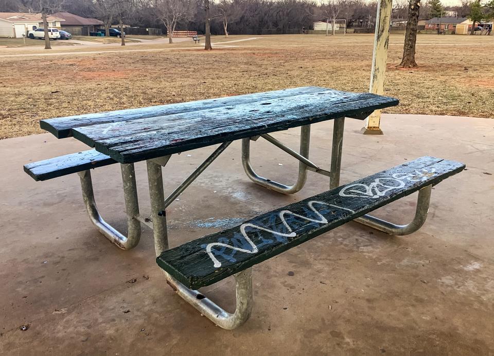 Benches, sidewalks and playground slides have been spray-painted with graffiti in Shallowbrook Park in Oklahoma City.