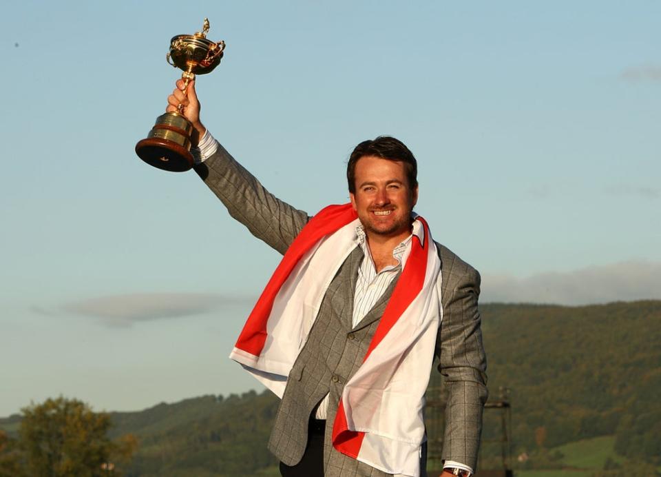 Graeme McDowell celebrates with the Ryder Cup trophy after Europe’s win at Celtic Manor in 2010 (Lynne Cameron/PA) (PA Archive)