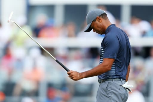 Tiger Woods of the US reacts on the 13th green during the first round of the 2018 US Open, at Shinnecock Hills Golf Club in Southampton, New York, on June 14