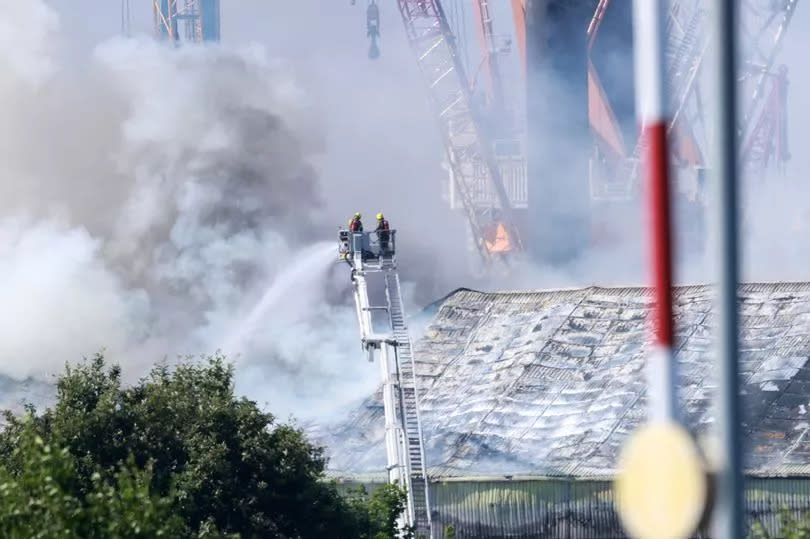 Fire crews tackle a huge b laze at the Port of Tyne in South Shields.