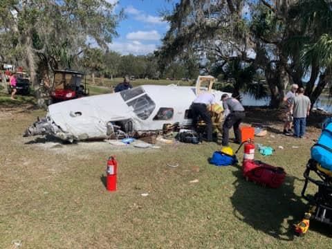 Two people escaped serious injuries on Thursday when this Piper Malibu plane crashed into a tree while taking off at the Spruce Creek Fly-In in Port Orange.