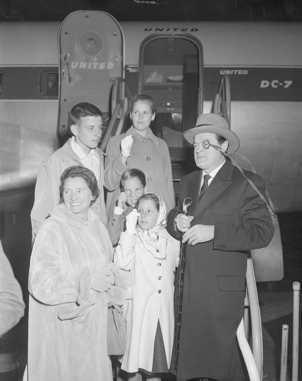 Bob Hope is greeted by his wife Dolores and four children, Linda, (16), Tony, (14), and Nora and Kelly, (8), at the International Airport as the comedian arrived from his European trip on March 6, 1956.