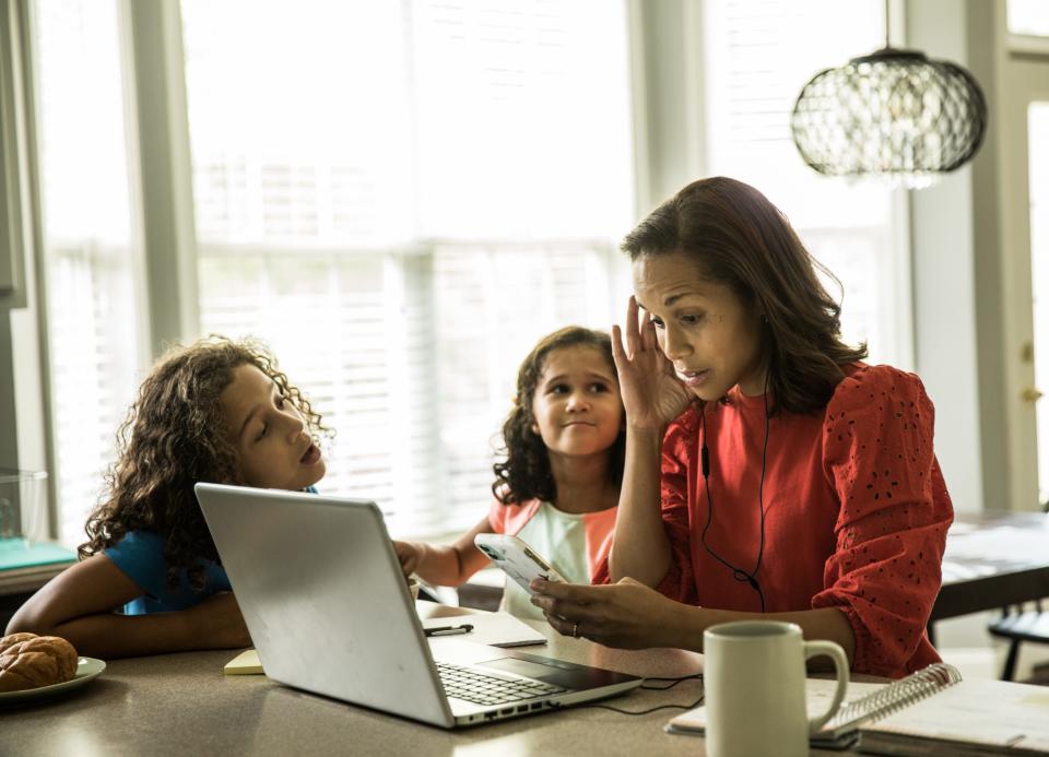 Mother and children during the work day.