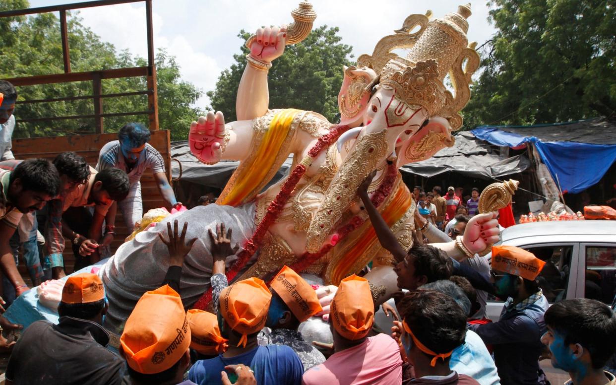 Prime Minister Modi suggested that the Hindu god Ganesh showed ancient Indians were capable of plastic surgery - AP