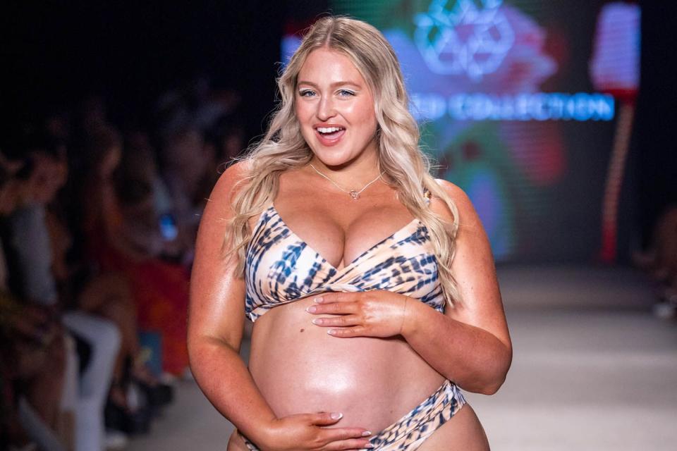 <p>courtesy Cupshe</p> Pregnant Iskra Lawrence modeling at Miami Swim Week 2024