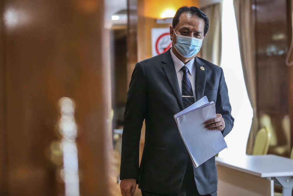 Health director-general Tan Sri Dr Noor Hisham Abdullah arrives for his daily press conference on Covid-19 in Putrajaya February 9, 2020. — Picture by Hari Anggara