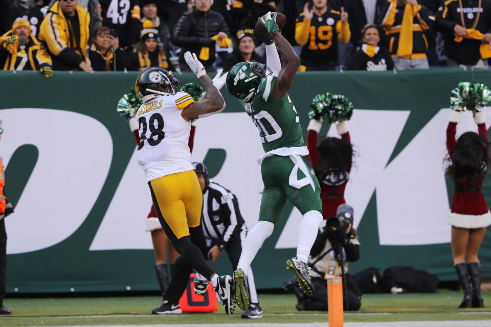 New York Jets free safety Marcus Maye (20) intercepts the ball in front of Pittsburgh Steelers running back Jaylen Samuels (38) during the first half of an NFL football game, Sunday, Dec. 22, 2019, in East Rutherford, N.J. (AP Photo/Seth Wenig)