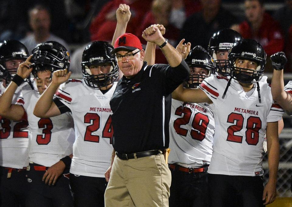 Pat Ryan was the legendary coach of Metamora High School for much of its rivalry with Washington.