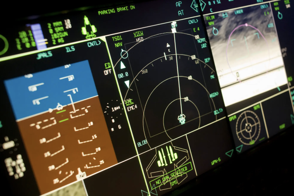 Glowing cockpit instrumentation of an F-35. <em>Photo by In Pictures Ltd./Corbis via Getty Images</em>