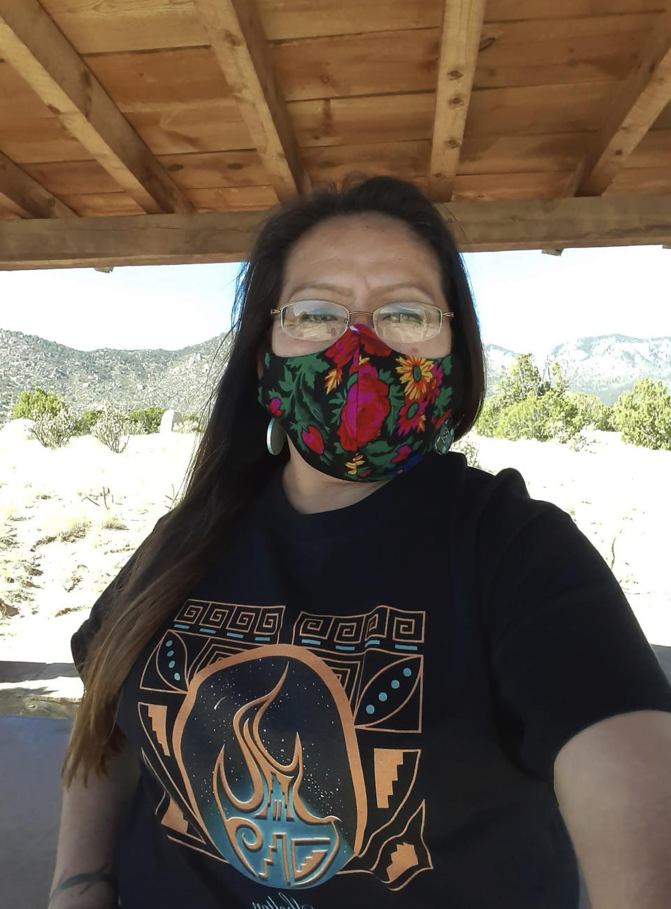 In this photo provided by Albertyn Pino, Pino poses for a selfie in Laguna Pueblo, N.M., Oct. 17, 2020. (Albertyn Pino via AP)