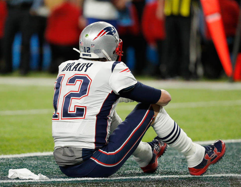 <p>New England Patriots’ Tom Brady sits on the field after the NFL Super Bowl 52 football game against the Philadelphia Eagles Sunday, Feb. 4, 2018, in Minneapolis. The Eagles won 41-33. (AP Photo/Charlie Neibergall) </p>