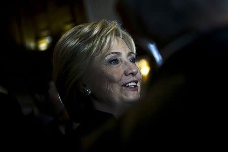 U.S. Democratic presidential candidate and former Secretary of State Hillary Clinton greets supporters after delivering the keynote address at the Brookings Institution Saban Forum at the Willard Hotel in Washington December 6, 2015. REUTERS/James Lawler Duggan