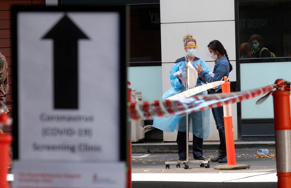 Picture of workers outside a coronavirus clinic in Victoria, where people can go if they qualify for testing