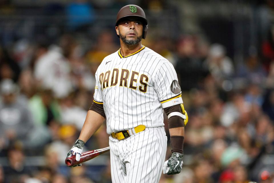 San Diego Padres' Nelson Cruz reacts after striking out to end the sixth inning of a baseball game against the Boston Red Sox on Saturday, May 20, 2023, in San Diego. (AP Photo/Brandon Sloter)