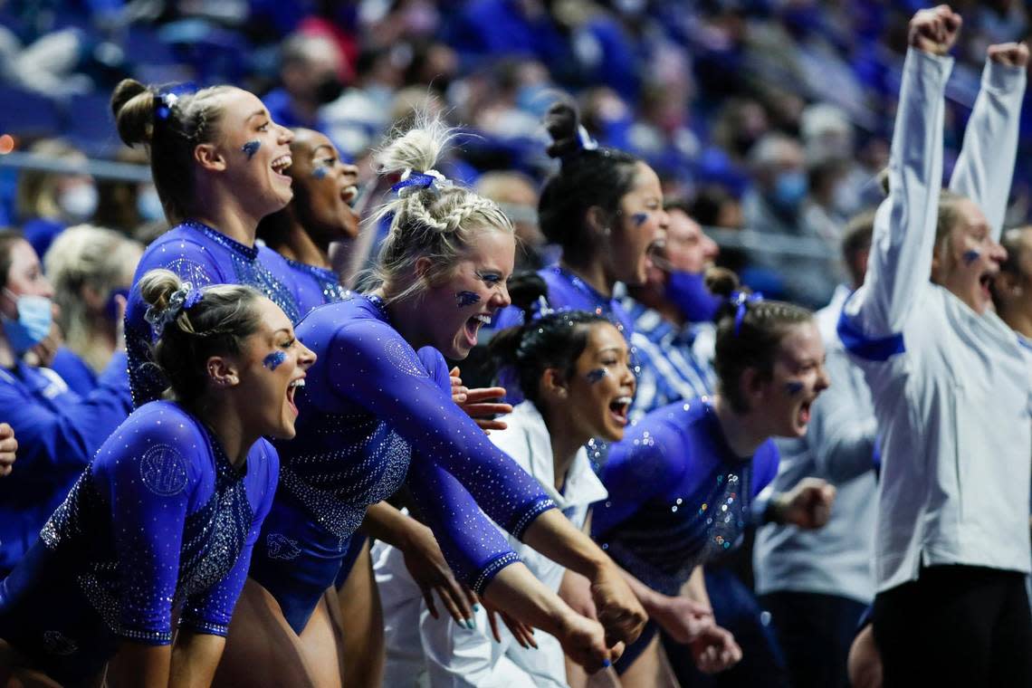 The Kentucky gymnastics team cheers on Raena Worley in the floor routine during the annual Excite Night meet at Rupp Arena in Lexington, Ky., Friday, January 14, 2022.