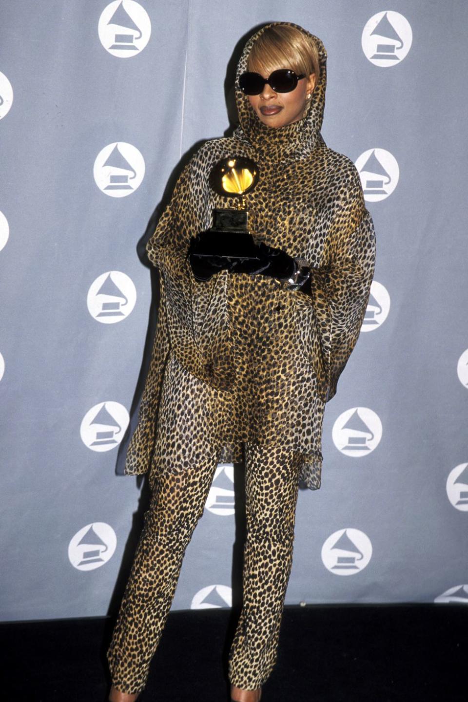 <p> In 1996, Mary J. Blige attended the Grammy Awards wearing a full leopard print ensemble with velvet gloves and dark sunglasses. It&apos;s safe to say this print will never go out of style. What a lewk. </p>