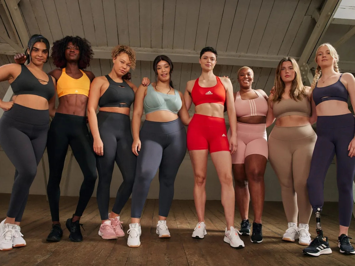 Adidas' sports bra ads featuring exposed breasts have been banned in the UK
