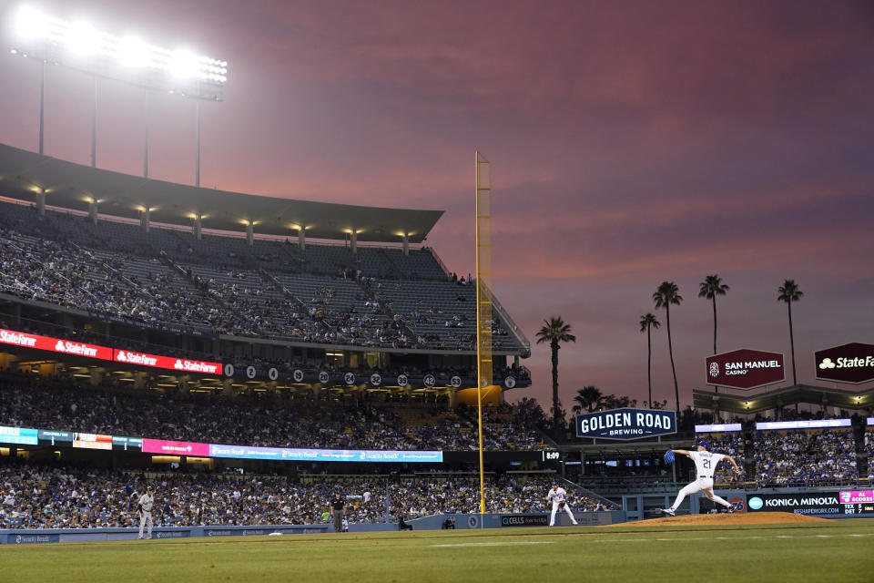 Los Angeles Dodgers starting pitcher Walker Buehler throws to a San Francisco Giants batter during the fourth inning of a baseball game Thursday, July 22, 2021, in Los Angeles. (AP Photo/Marcio Jose Sanchez)
