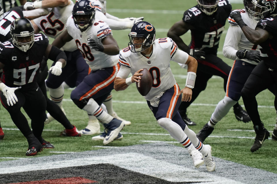 Chicago Bears quarterback Mitchell Trubisky (10) runs out of the pocket against the Atlanta Falcons during the first half of an NFL football game, Sunday, Sept. 27, 2020, in Atlanta. (AP Photo/Brynn Anderson)