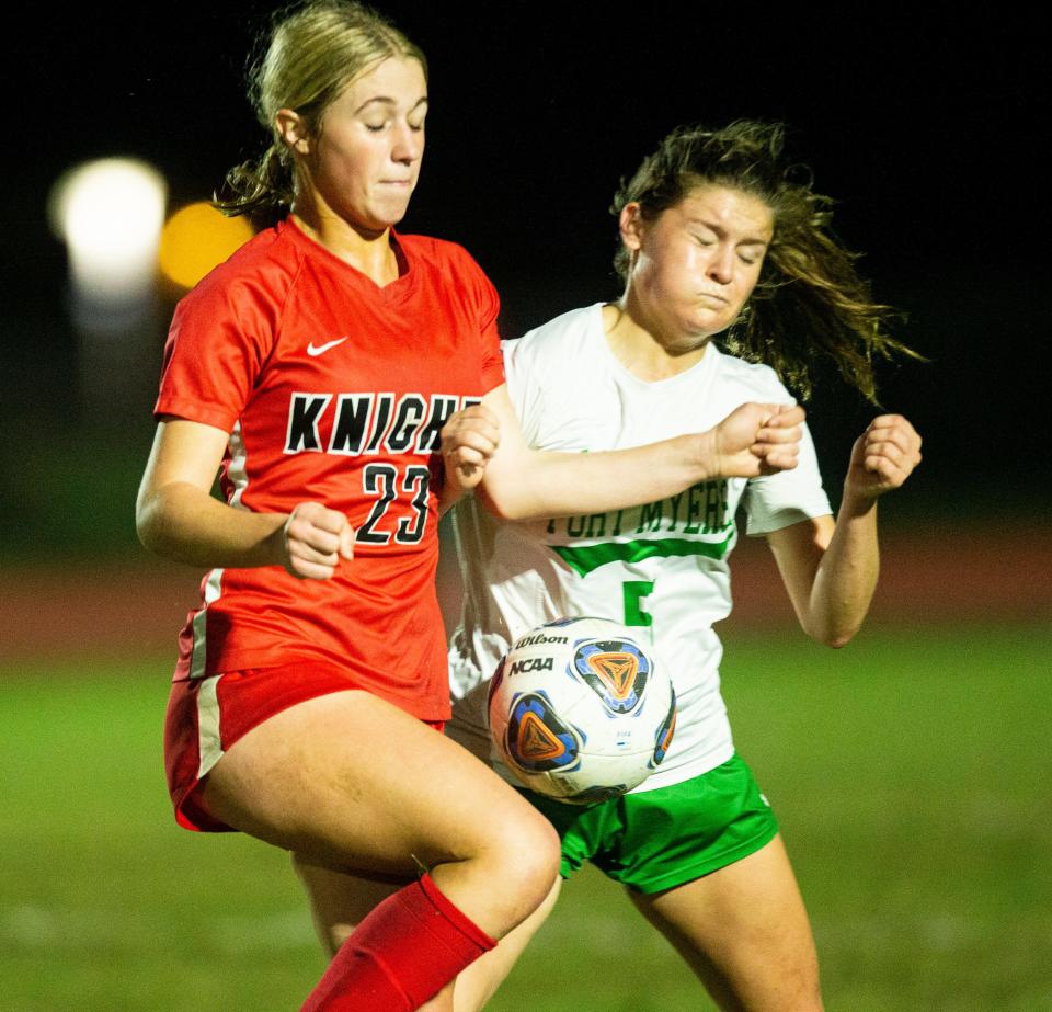 Hannah Busenbark, left, of the North Fort Myers High School girls soccer team and Sammy Degen of Fort Myers go  for the ball during a game at North Fort Myers High School on Wednesday, Jan. 11, 2022. North won.  