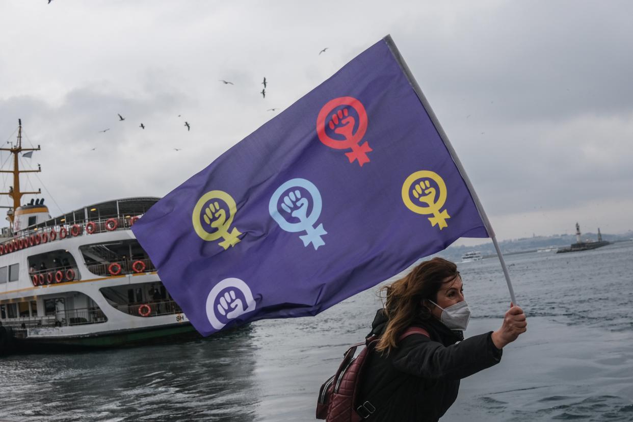  female protestor hold feminist flag and shout slogans during demonstration on the occasion of the International Day for the Elimination of Violence Against Women in Istanbul at the weekend (EPA)