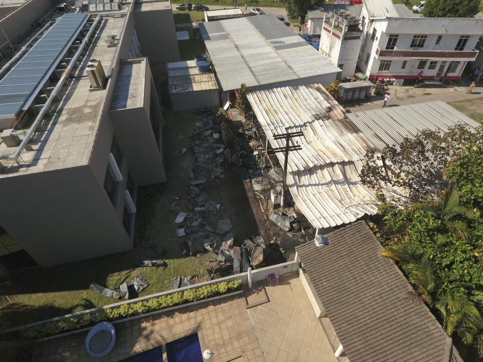 An aerial view looks over the Flamengo soccer club training complex where an early morning fire left a number of people dead and injured in Rio de Janeiro, Brazil, Friday, Feb. 8, 2019. (AP Photo/Renato Spyrro)