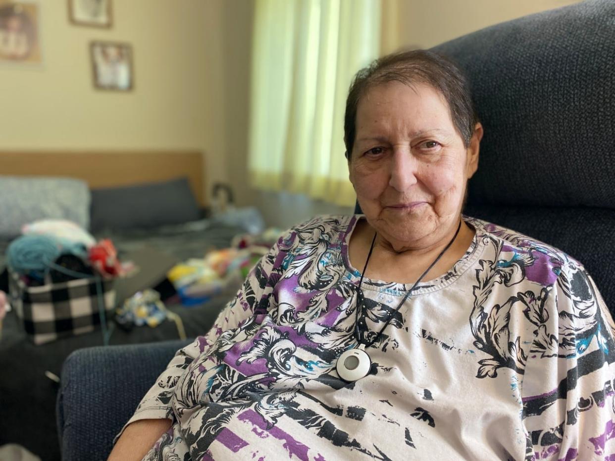 Arlene Best in her bachelor room at Northwood's assisted living facility in Halifax. Best says she's unsure how her family will find enough money to pay for upgrades to sewer and water pipes required before she can subdivide a family-owned duplex and sell her half. (Haley Ryan/CBC - image credit)
