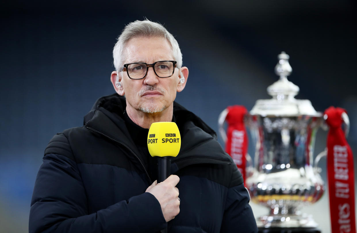 LEICESTER, ENGLAND - MARCH 21: Gary Lineker, BBC Sport TV Pundit looks on whilst standing next to the FA Cup trophy prior to the Emirates FA Cup Quarter Final  match between Leicester City and Manchester United at The King Power Stadium on March 21, 2021 in Leicester, England. Sporting stadiums around the UK remain under strict restrictions due to the Coronavirus Pandemic as Government social distancing laws prohibit fans inside venues resulting in games being played behind closed doors.  (Photo by Alex Pantling/Getty Images)