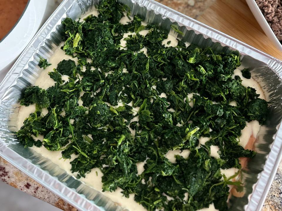 hotel tray full of spinach lasagna