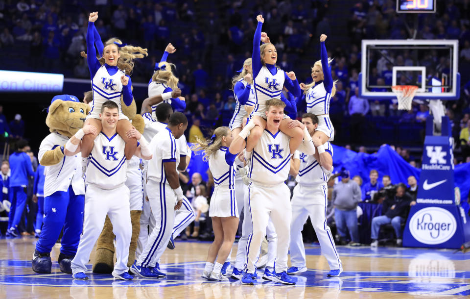 According to UK, a lake party involving public nudity and excessive alcohol use prompted an investigation into the nation's most successful cheerleading team. (Andy Lyons/Getty Images)