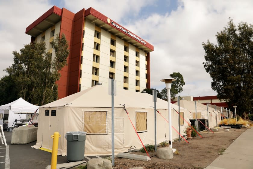 SANTA ANA-CA-DECEMBER 11, 2020: Triage tents are set up outside of the Emergency Room at Orange County Global Medical Center in Santa Ana on Friday, December 11, 2020. (Christina House / Los Angeles Times)