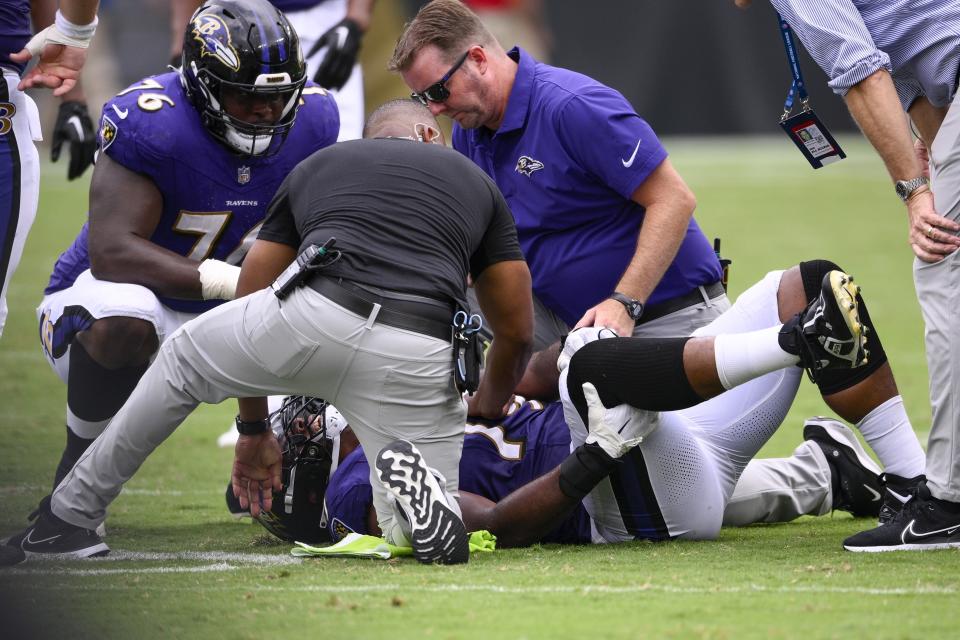 Baltimore Ravens' Ronnie Stanley is hurt during the second half of an NFL football game against the Houston Texans Sunday, Sept. 10, 2023, in Baltimore. (AP Photo/Nick Wass)