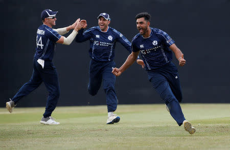 FILE PHOTO: Scotland's Safyaan Sharif celebrates sealing first ever one-day international win against England, June 10, 2018 Action Images via Reuters/Craig Brough/File Photo