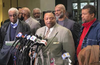 Rev. Marvin Hunter speaks to reporters after a judge acquitted three Chicago police officers of trying to cover up the 2014 shooting of black teenager Laquan McDonald, Thursday, Jan. 17, 2019, in Chicago. Judge Domenica Stephenson said that after considering all of the evidence, including police dashcam video of the killing, she didn't find that officer Thomas Gaffney, Joseph Walsh and David March conspired to cover up the shooting. The officer who shot McDonald 16 times, Jason Van Dyke, was convicted of murder in October and is due to be sentenced Friday. (Noreen Nasir/AP)