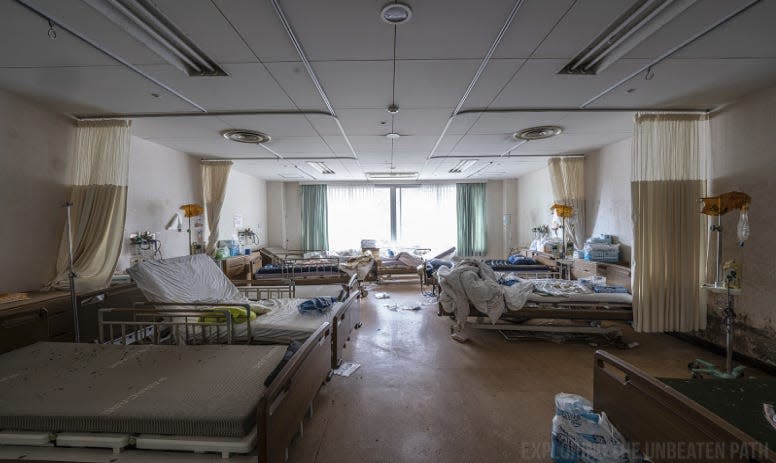 Personal items and equipment left behind in an abandoned hospital in Fukushima.