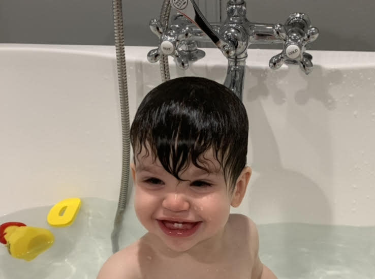 Erica Cramer's son playing in the bath. (Photo: Erica Cramer)