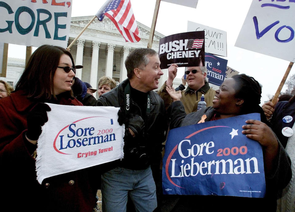 Supporters of Democrat Al Gore and Republican George W. Bush facing off in front of the Supreme Court