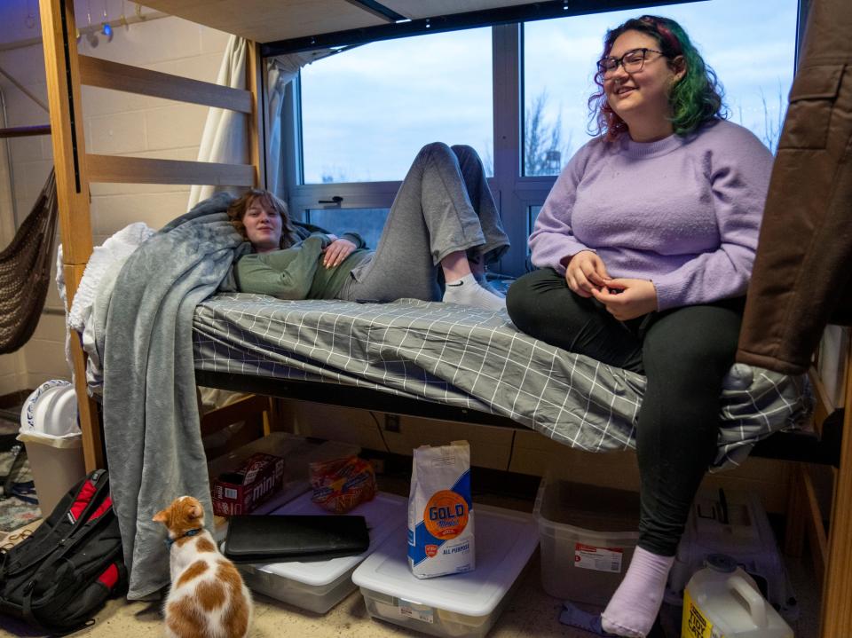 Lauren Bobko (left), and friend Abigail Turner on Wednesday, Jan. 31, 2024, at Turner’s dorm room on the University of Indianapolis campus. Turner has Retinitis pigmentosa, a rare disease that contracts her vision to a small spot at the center of her vision.