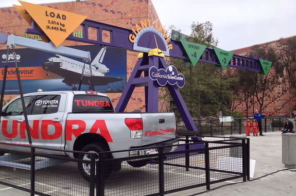 The Toyota Tundra pickup truck that towed NASA's space shuttle Endeavour part of the way to the California Science Center (CSC) in October 2012 is now part of the center's Giant Lever exhibit.