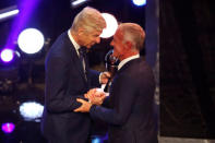 Soccer Football - The Best FIFA Football Awards - Royal Festival Hall, London, Britain - September 24, 2018 Arsene Wenger presents Didier Deschamps with the Best Men's Coach award Action Images via Reuters/John Sibley