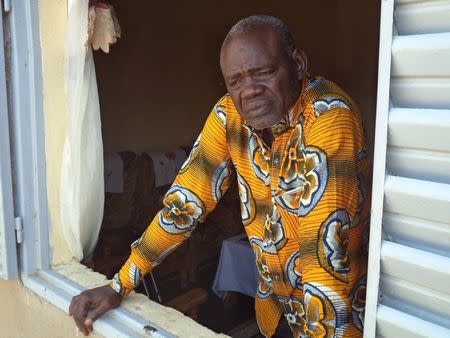 Clement Abaifouta, the head of an association of victims of former Chadian dictator Hissene Habre, poses for a picture at his home in Ndjamena, Chad, July 11, 2015. REUTERS/Moumine Ngarmbassa