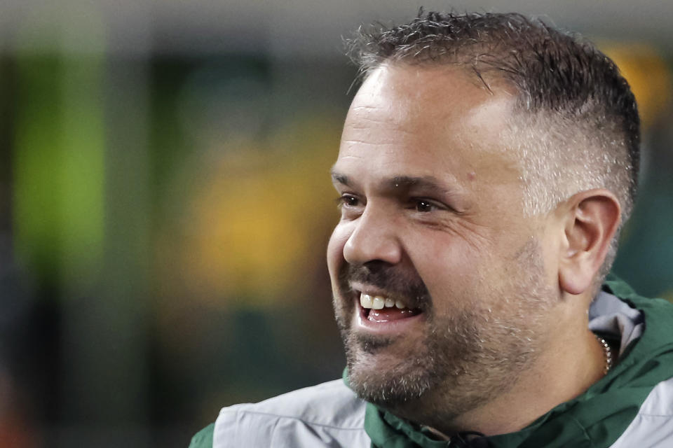 FILE - In this Nov. 16, 2019, file photo, Baylor head coach Matt Rhule stands on the field prior to an NCAA college football game against Oklahoma in Waco, Texas. A person familiar with the situation says the Carolina Panthers are completing a contract to hire Baylor's Matt Rhule as their coach. The person spoke to The Associated Press on Tuesday, Jan. 7, 2020, on condition of anonymity because the deal is not done. The Panthers have not spoken publicly about the coaching search. (AP Photo/Ray Carlin, File)