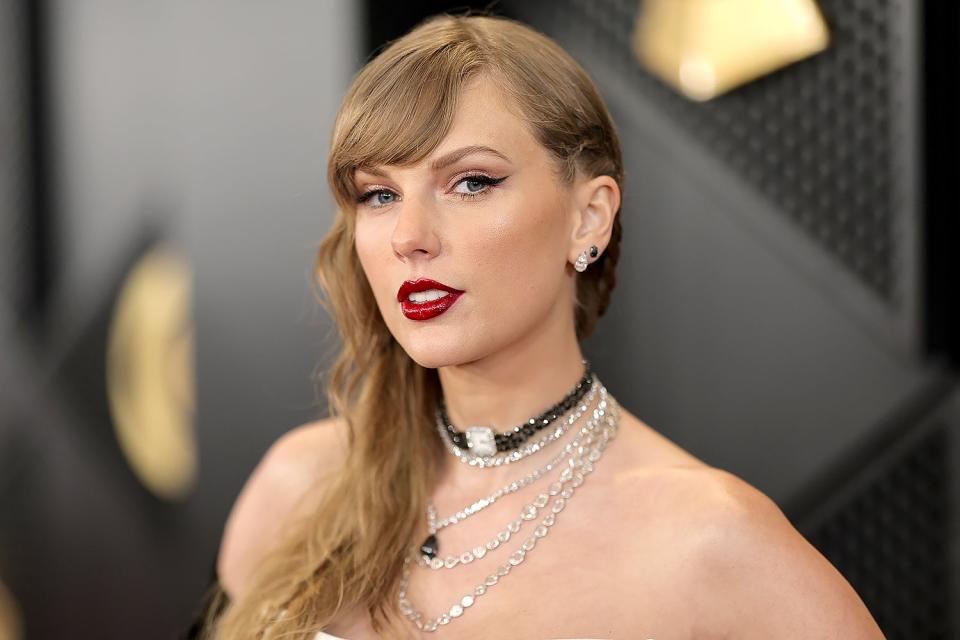 <p>Neilson Barnard/Getty</p> Taylor Swift attends the 66th GRAMMY Awards