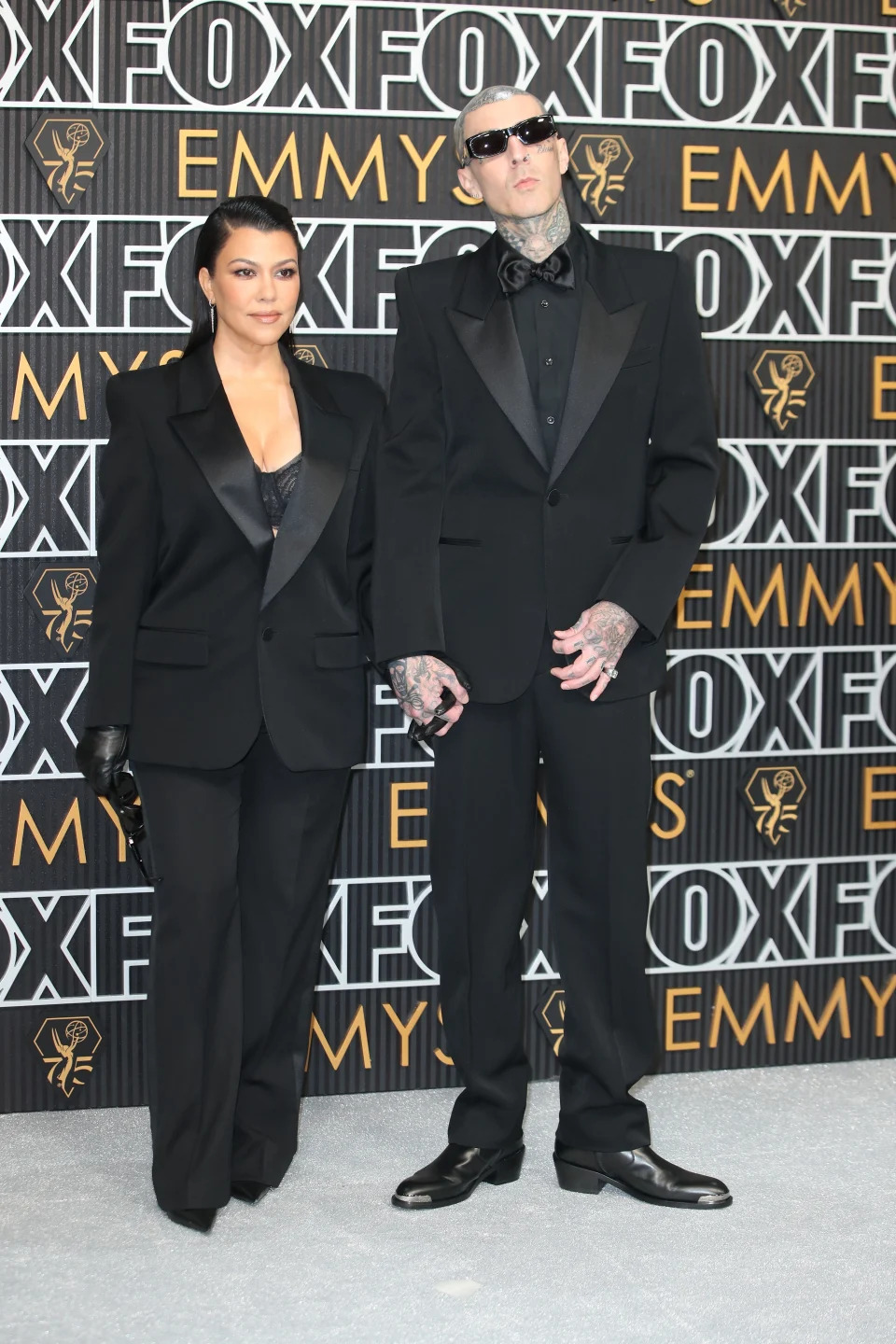 Kourtney Kardashian and Travis Barker at the 75th Primetime Emmy Awards during a child-free date night.