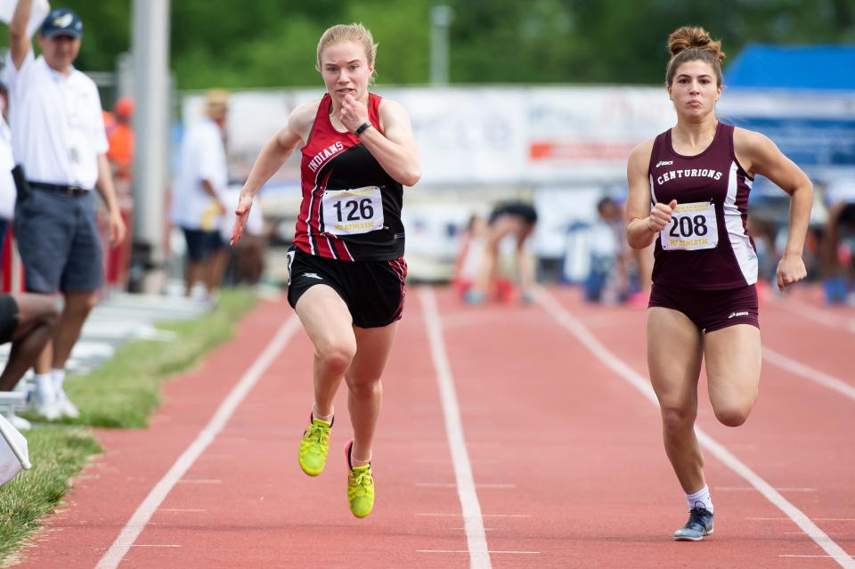 Conemaugh Township Area's Mary Hostetter (126) races to a medal in the 2A girls' 100-meter dash at the PIAA Track and Field Championships at Shippensburg University on Saturday, May 28, 2022.