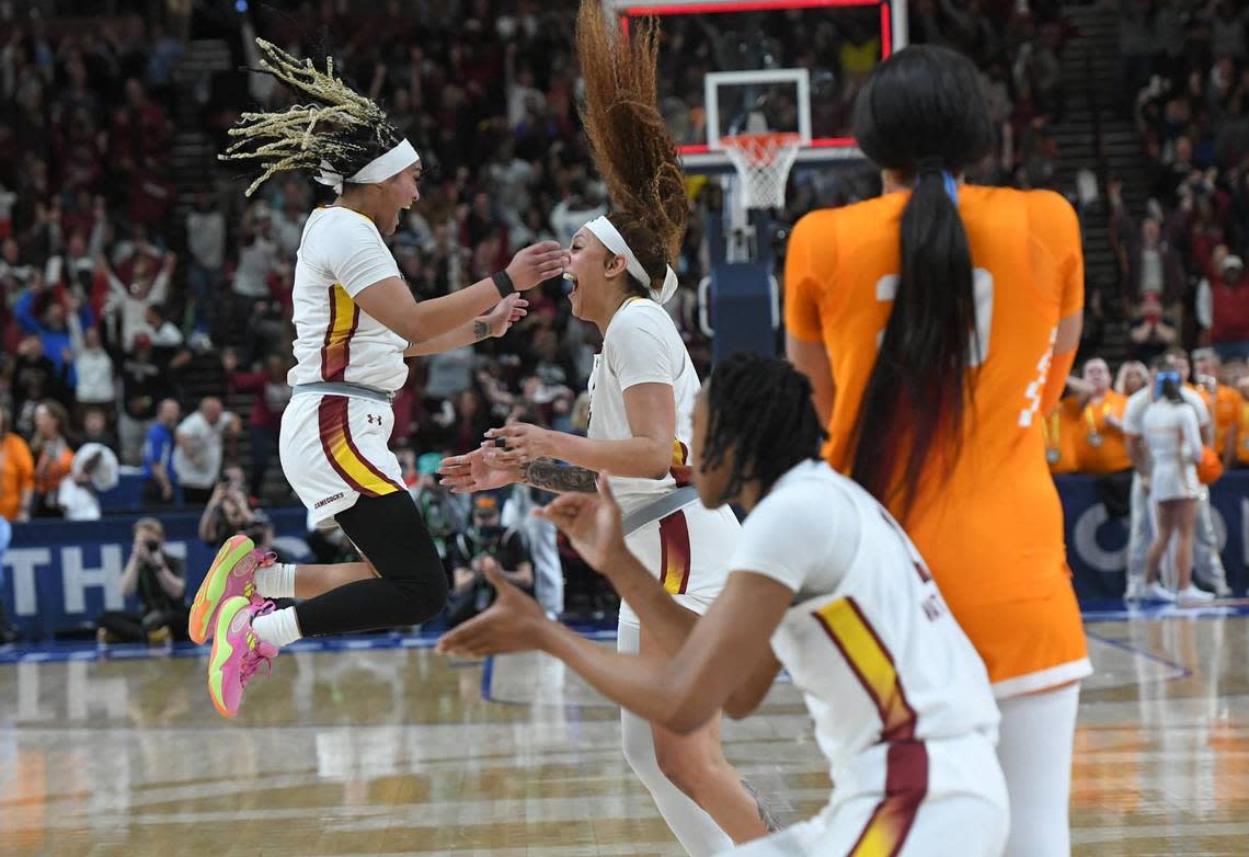 South Carolina’s Kamilla Cardoso, center, celebrates making the game-winning shot against Tennessee with teammate Te-Hina Paopao, left, in the SEC Tournament semifinals at the Bon Secours Wellness Arena in Greenville, South Carolina. South Carolina went on to win the SEC Tournament title and enters the NCAA Tournament with a 32-0 record. Ken Ruinard/USA TODAY NETWORK
